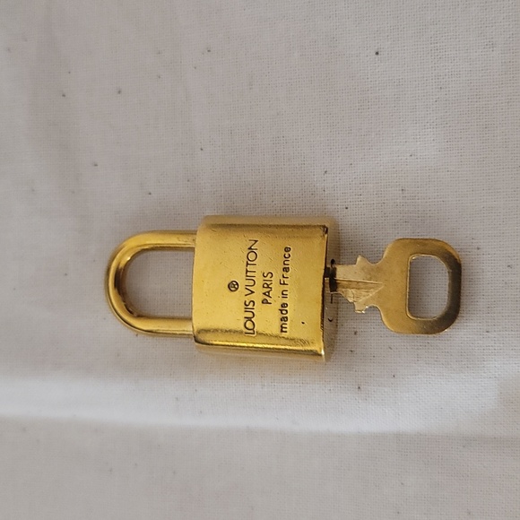 LV Lock and Key  chain not included - Picture 3 of 4